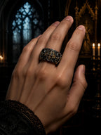 Lost Order Crusader Ring on male hand — ~18 mm armorial band with allover Gothic arch portal and heraldic cross pattern