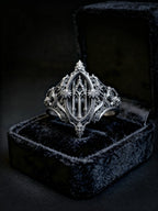 Eternal Choir ring side view — chiaroscuro light through openwork windows, 925 silver