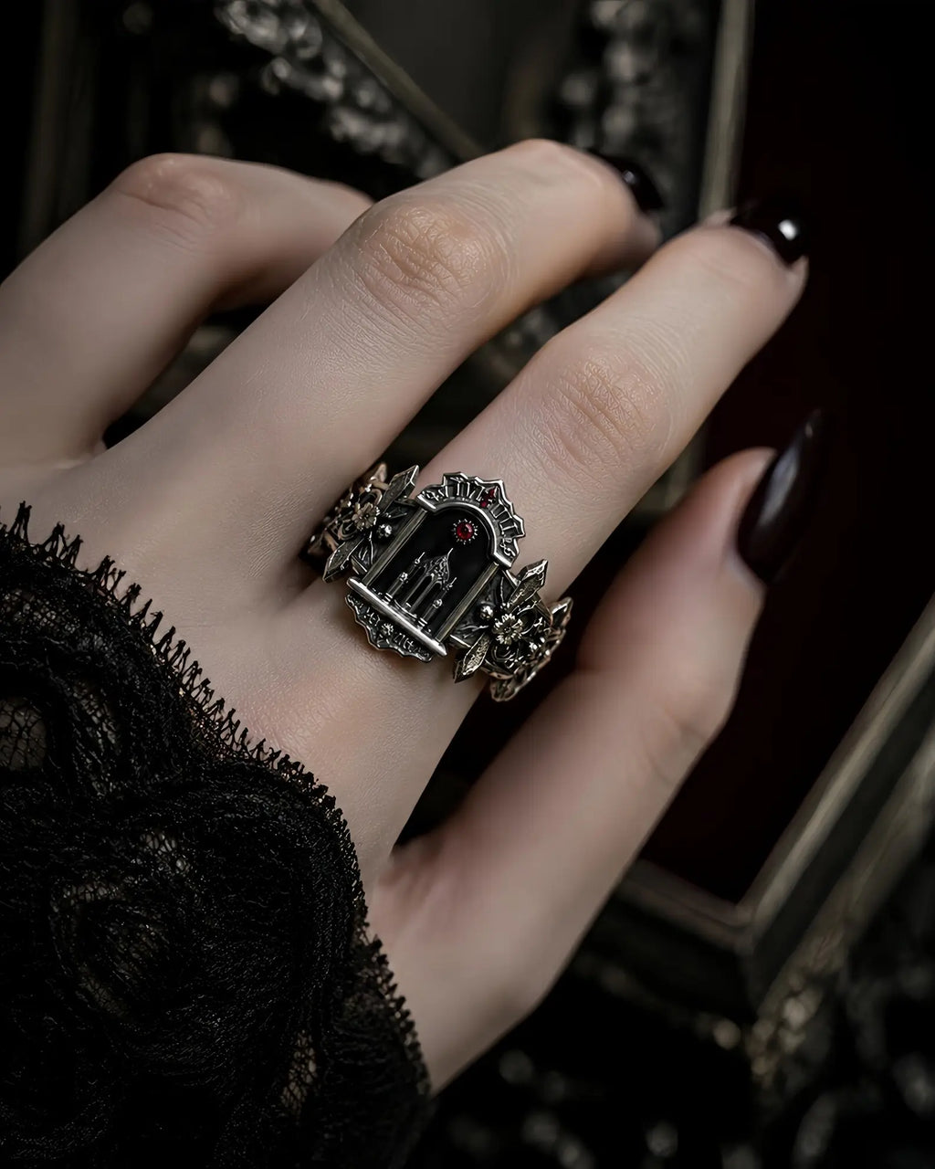 Model wearing the Crimson Portal Gothic altar ring, oxidized sterling silver statement ring on the hand