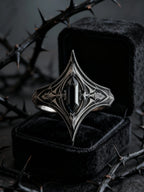Side profile of gothic elven ring showing V-silhouette band detail