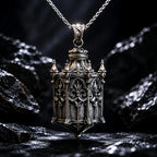 Sterling silver Cathedral Lantern Gothic pendant necklace on a chain against dark rock