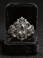 Cathedral Crest Ring side profile — medieval gothic band with deep oxidized patina and chiaroscuro tracery